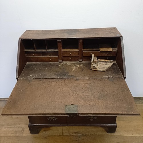 1020 - A 18th century oak bureau, with original handles, 92 cm wide