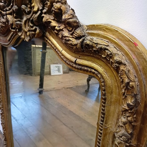 1039 - A gilt gesso Rococo style pier mirror, 125 x 78 cm