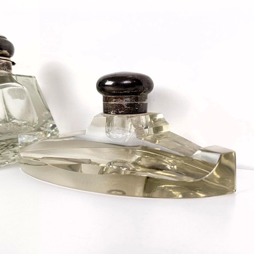 722A - A cut glass inkwell, with a silver mount, London 1948, and another (2)