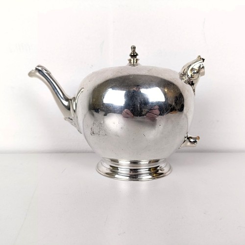 714A - A George III silver bullet form teapot, London 1776, 13.7 ozt, lacking handle