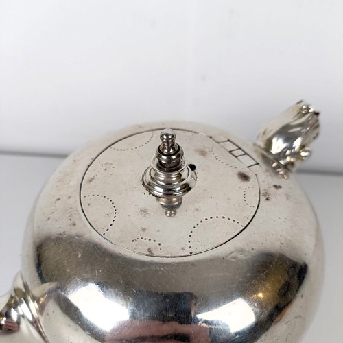 714A - A George III silver bullet form teapot, London 1776, 13.7 ozt, lacking handle