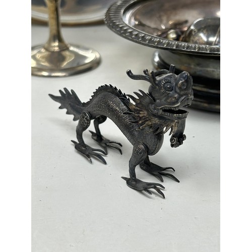 648 - A pair of Chinese silver coloured metal dragons, and assorted silver plate (box)