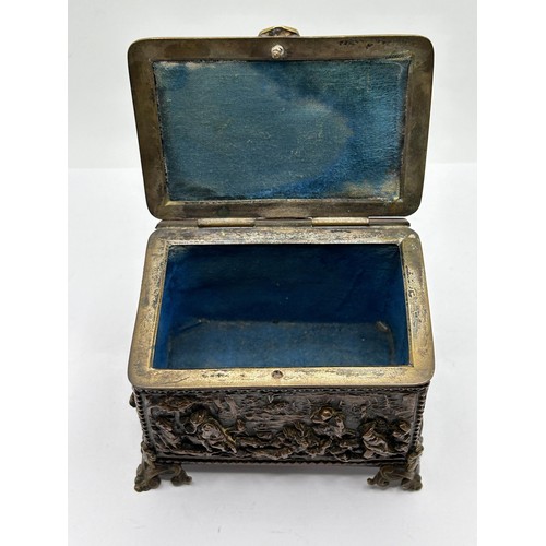 682 - A French ring box, decorated a hunting scene, stamped A B Paris, 8 cm wide