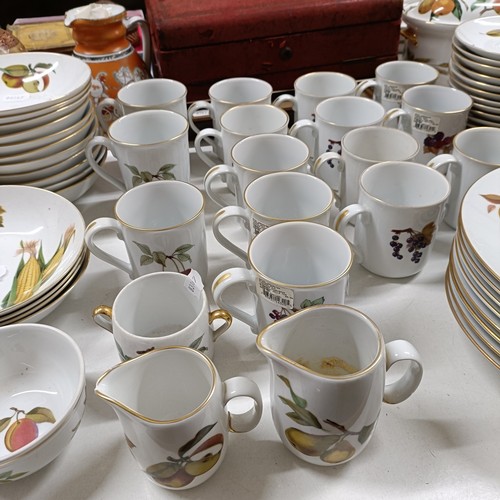 821 - An extensive Royal Worcester Evesham service, comprising plates, tureens, teapots, storage jars, cup... 