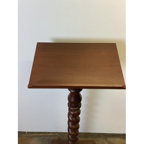 930 - A mahogany lectern, 122 cm high