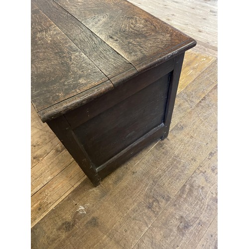 1038 - An oak coffer, 135 cm wide