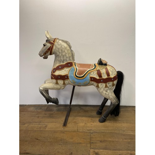 761 - A painted carousel type horse, 127 cm high