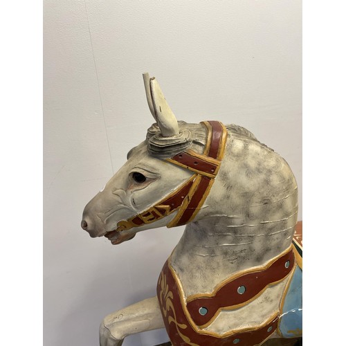 761 - A painted carousel type horse, 127 cm high