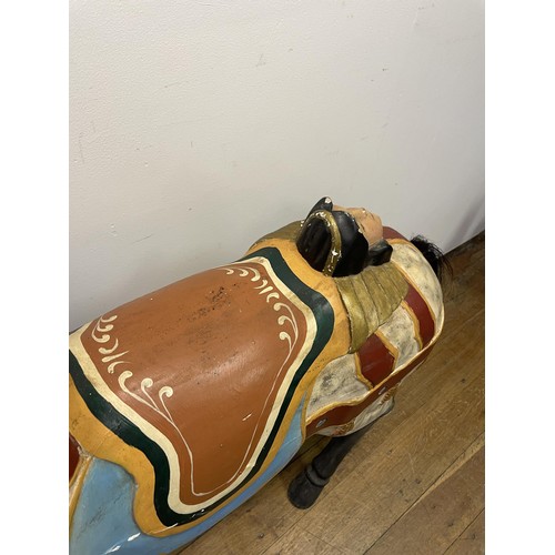 761 - A painted carousel type horse, 127 cm high