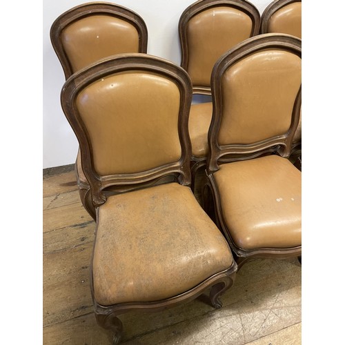 970 - A set of ten French walnut dining chairs, with padded backs and drop in seats, on cabriole legs (10)