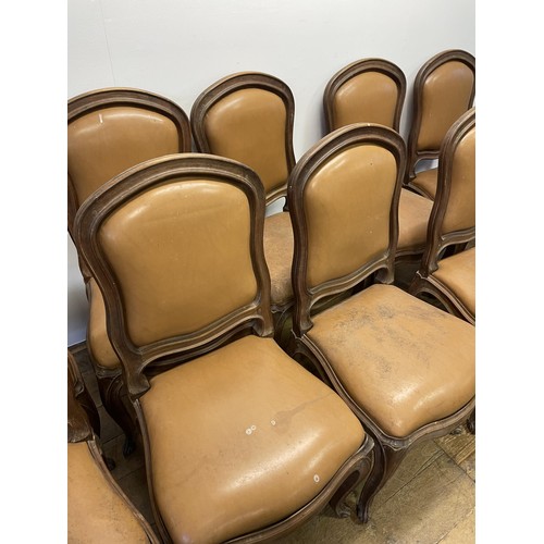 970 - A set of ten French walnut dining chairs, with padded backs and drop in seats, on cabriole legs (10)