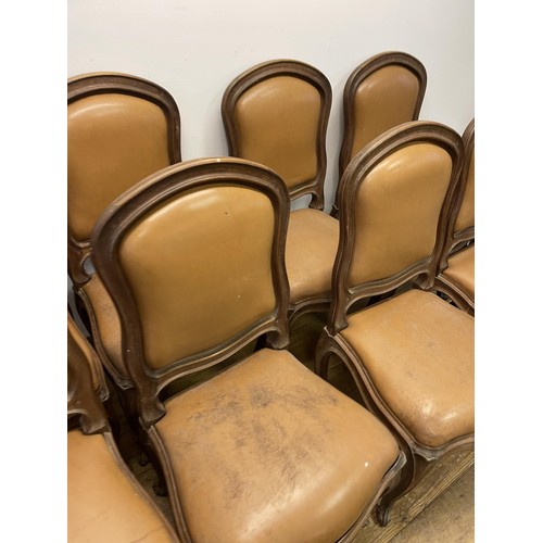 970 - A set of ten French walnut dining chairs, with padded backs and drop in seats, on cabriole legs (10)