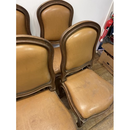 970 - A set of ten French walnut dining chairs, with padded backs and drop in seats, on cabriole legs (10)