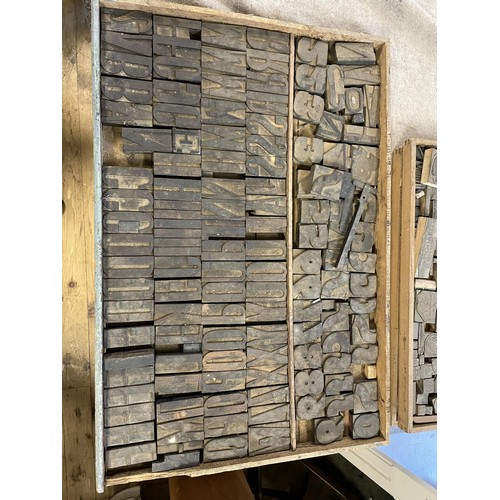 851 - A large quantity of vintage printing letter and image blocks, in thirteen trays