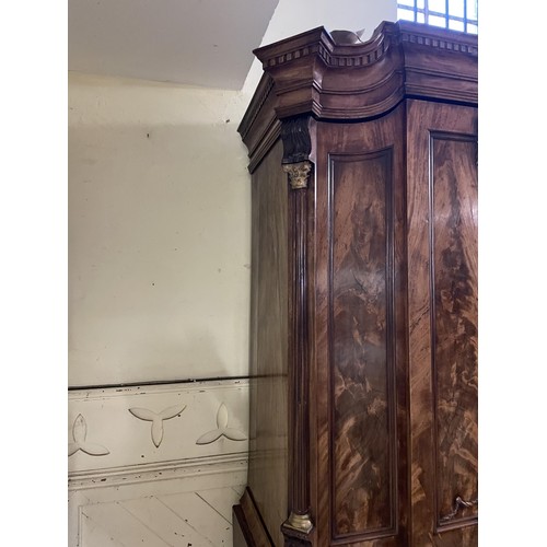 998 - An 18th century Dutch armoire, with two cupboard doors to reveal shelf and drawers, on a base with t... 