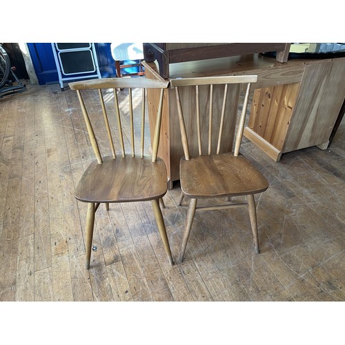 1051 - A Captain's elm chair, a set of four dining chairs, a set of four dining chairs, a trunk, and a tabl... 