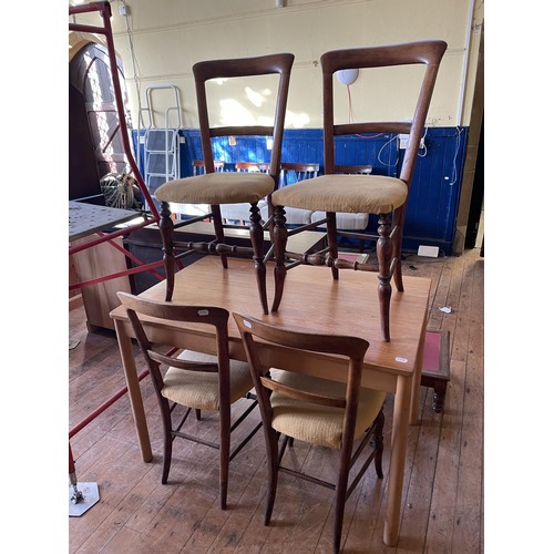 1051 - A Captain's elm chair, a set of four dining chairs, a set of four dining chairs, a trunk, and a tabl... 