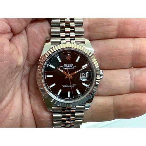 603 - A gentleman's Rolex Oyster Perpetual DateJust 41 steel black baton dial wristwatch, with a white gol... 