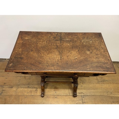 1005 - A burr oak folding card table, on barley twist twin end support to splayed legs, 81 cm wide