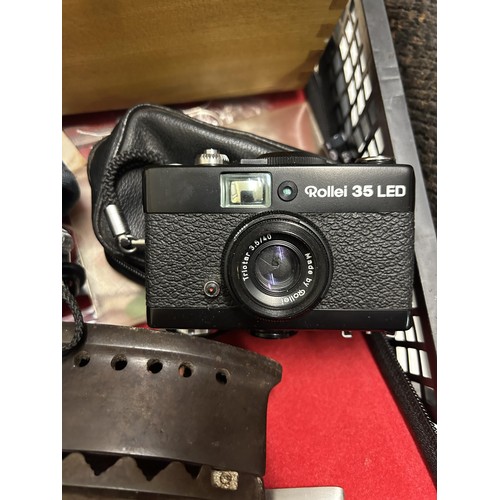 891 - A Rollei 35 LED camera, a student's microscope, and assorted other items (box) Provenance:  Sold on ... 