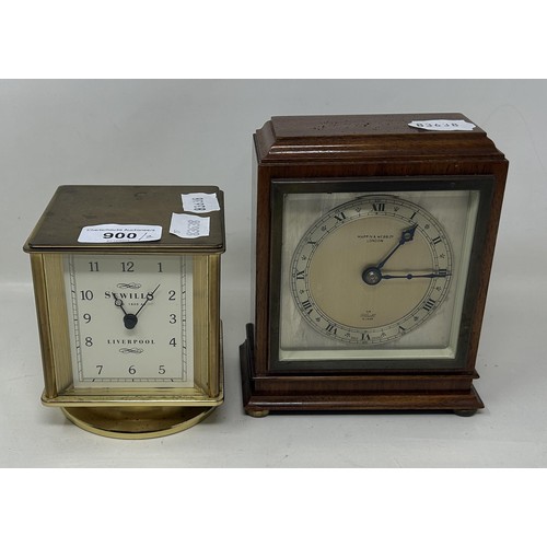 900 - A desk clock, by Sewills of Liverpool, with four dials, and a mantel clock (2)