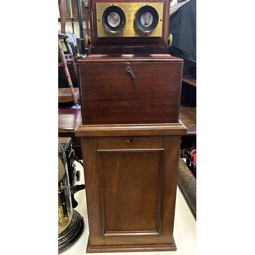 894 - A 19th century mahogany cased stereoscope viewer, and assorted slides, in a mahogany case, 48 cm x 2... 