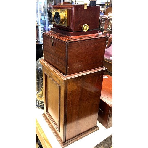 894 - A 19th century mahogany cased stereoscope viewer, and assorted slides, in a mahogany case, 48 cm x 2... 