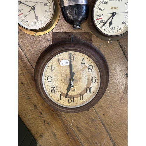 910 - A Smiths eight day wall clock, two clocks converted from pressure gauges, and a hip flask