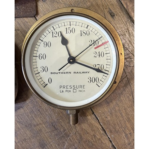 910 - A Smiths eight day wall clock, two clocks converted from pressure gauges, and a hip flask