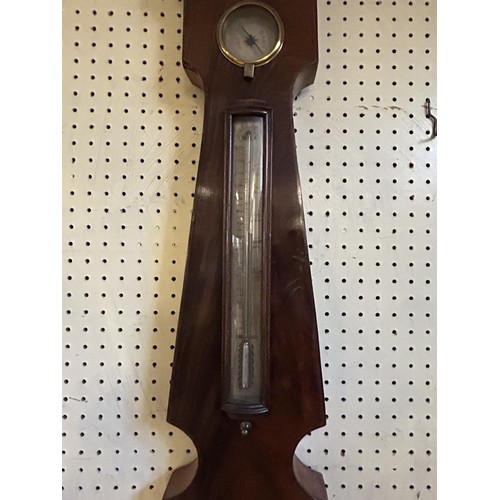 918 - A wheel barometer, in a mahogany case, 110 cm high