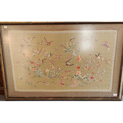 855 - A Chinese silk panel, decorated butterflies, 70 x 120 cm, and two prints (3)