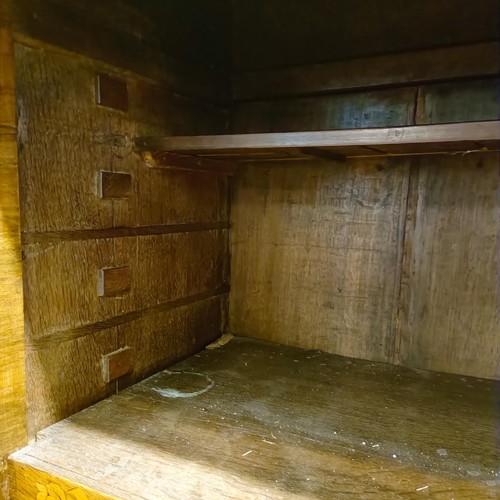 685 - A 19th century Dutch mahogany linen press, with floral marquetry decoration, the two cupboard doors ... 