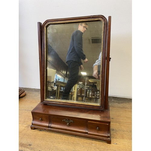 649 - A 19th century mahogany dressing mirror, the base having three drawers, 43 cm wide