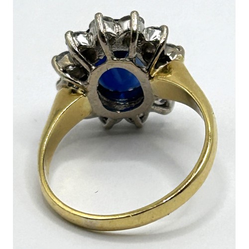 180 - An 18ct gold, sapphire and diamond cluster ring, ring size P