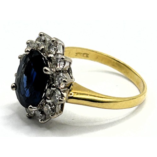 180 - An 18ct gold, sapphire and diamond cluster ring, ring size P