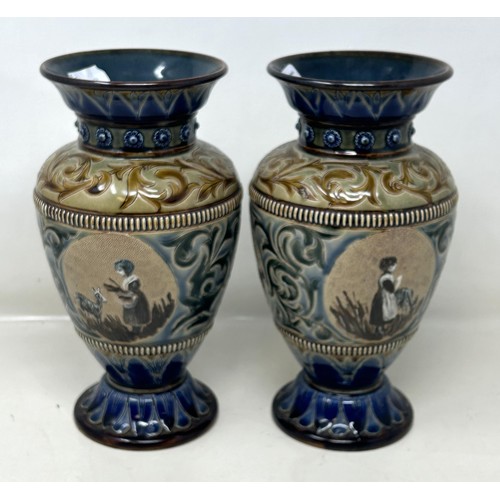 391 - A pair of Doulton Lambeth vases, by Hannah Barlow, decorated children and goats, 24 cm high