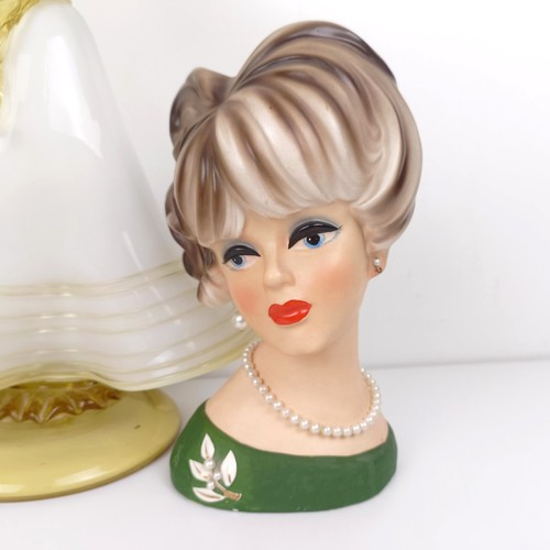 378 - A pair of Napcoware novelty vases, in the form of a woman's head, 22 cm high, and a Murano style gla... 