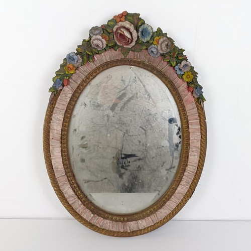 376 - An Art Deco Barbola style oval strut mirror, decorated flowers, 57 x 47 cm