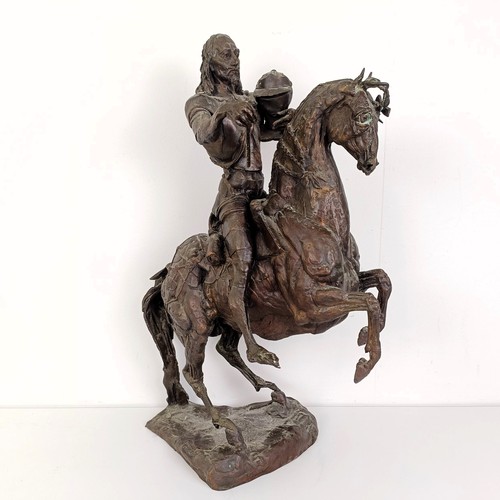 381 - A 20th century bronze group, of a horse and rider, 50 cm high