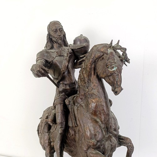 381 - A 20th century bronze group, of a horse and rider, 50 cm high