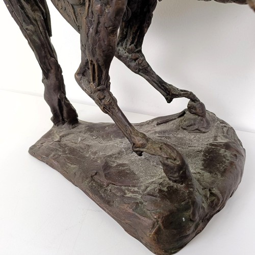 381 - A 20th century bronze group, of a horse and rider, 50 cm high