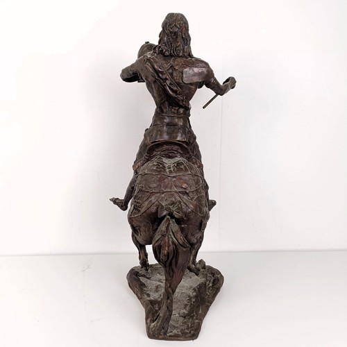 381 - A 20th century bronze group, of a horse and rider, 50 cm high