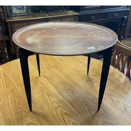 428 - A Danish folding tray top table, stamped FH, 60 cm diameter