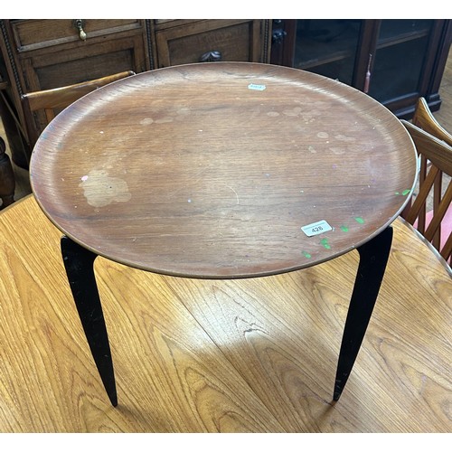 428 - A Danish folding tray top table, stamped FH, 60 cm diameter