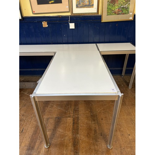 426 - An Italian Ciancimino stainless steel and laminate three section table