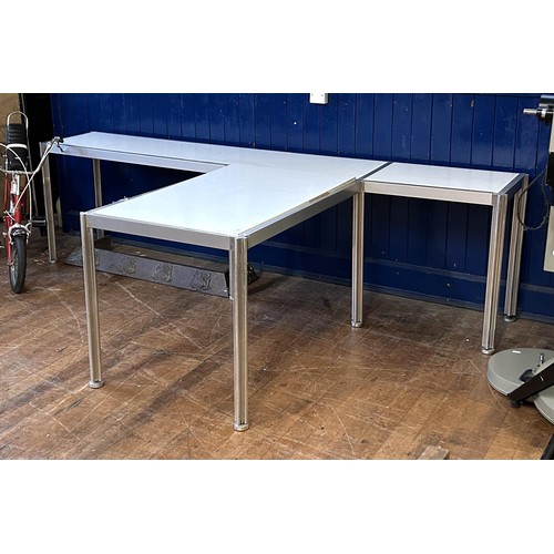 426 - An Italian Ciancimino stainless steel and laminate three section table