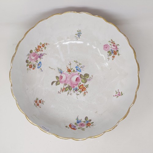 503 - A Continental porcelain bowl, with a red ground, decorated flowers, highlighted in gilt, 34 cm diame... 