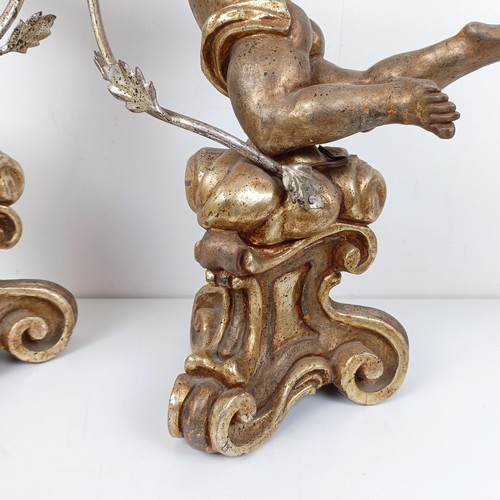 506 - A pair of giltwood and metal lamps, in the form of cherubs, 80 cm high (2)