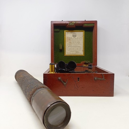 509 - A 19th century brass adjustable telescope, 52 cm wide, and a Husun sextant, in a mahogany case (2)