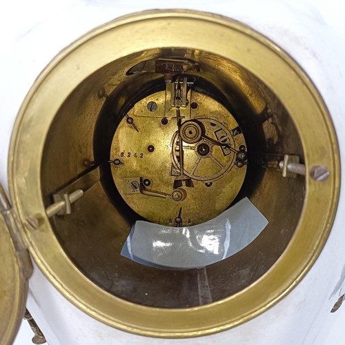 513 - A mantel clock, the enamel dial with Roman numerals, in a Delft case with gilt metal mounts, 47 cm h... 